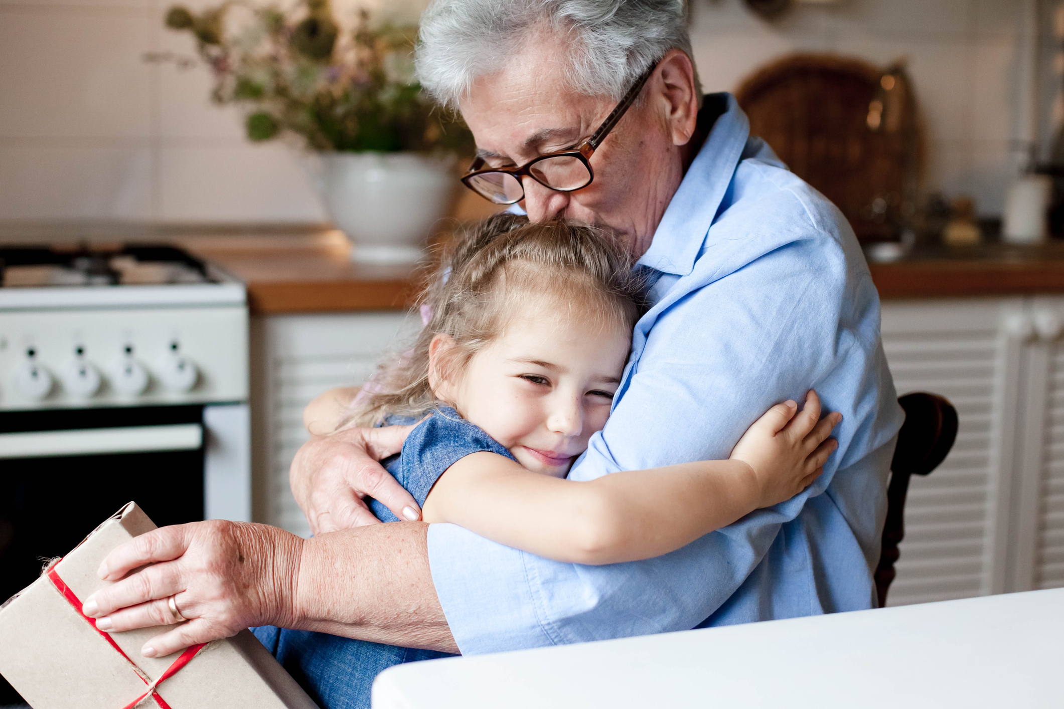 grandparent-with-child-hug desktop